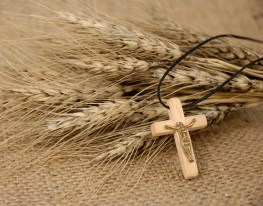 Christian cross on wheat ears - religious concept